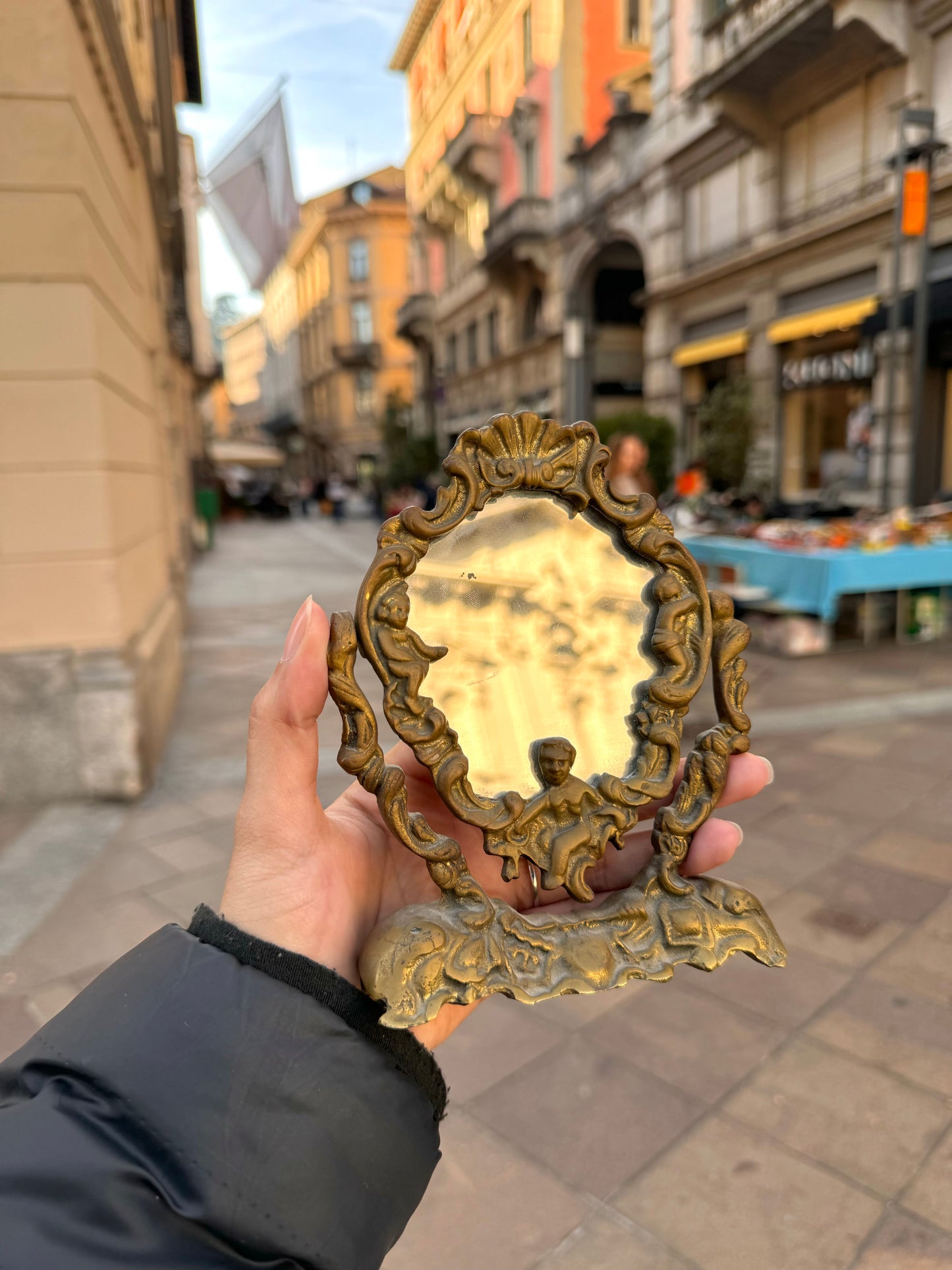 Vintage baroque table mirror with cherubic figures